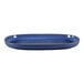 A blue oval porcelain plate with a black rim.