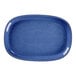 A blue oval RAK Porcelain plate with a gold rim.