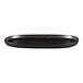 A black oval RAK Porcelain Forge plate.