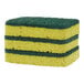 A stack of yellow and green Clorox scrubber sponges.