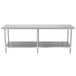 A long stainless steel Advance Tabco work table with an undershelf.