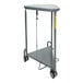 A grey triangular hamper with wheels.