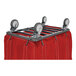A red R&B Wire laundry cart with swivel casters.