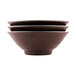 A stack of three Elite Global Solutions abyss-colored melamine bowls.