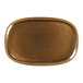 A brown oval RAK Porcelain plate with a white background.