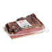 A large piece of Recla Dry-Cured Smoked Speck in a plastic bag.