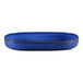 A blue oval porcelain dish with a black rim.