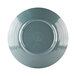 An abyss blue Elite Global Solutions round melamine plate with a rim.