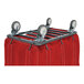 A red R&B Wire Products laundry cart with swivel casters on a metal frame.