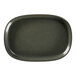 A dark green RAK Porcelain oval plate with a black rim.