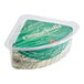 A wedge of Gelmini Cinque Stelle DOP Dolce creamy Gorgonzola cheese in a green and gold foil wrapper, packaged in a clear plastic container.