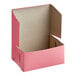 A Southern Champion pink bakery box with the lid open.