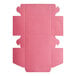 A pink bakery box with a cut out lid.