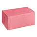 A pink Southern Champion cake box with a lid.