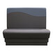 A grey and black booth with a black wave design on the back.