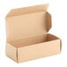 A plain, rectangular kraft paper candy box with an open lid.
