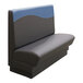 A dark blue booth with a wave design on the back and blue seat.