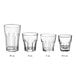 Acopa Memphis clear espresso glass with a curved edge.