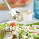 A salad with Over the Moon blue cheese crumbles on top.