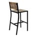 A BFM Seating black powder-coated steel barstool with a wood seat and back.