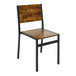 A BFM Seating Chester side chair with a vintage walnut wood seat and back and black metal legs.