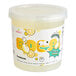 A plastic container of Bossen Sour Lemon Bursting Boba with yellow and white text filled with yellow liquid.