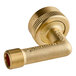 A gold metal pipe with a nut on a brass Eastman dishwasher elbow.