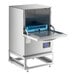 A Noble Warewashing undercounter dishwasher with a blue tray inside.