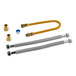 An Eastman gas water heater installation kit with metal hoses and a tube.