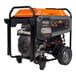 A close-up of a Generac portable generator with black and orange wheels.