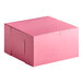 A Southern Champion pink cake box with a lid.