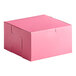 A pink Southern Champion cake box with a lid.