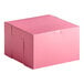 A pink Southern Champion cake box with a cut out lid.