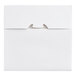 A white rectangular Southern Champion bakery box with a hole in the middle.