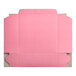 A pink box with a cut out top.