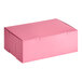 A pink Southern Champion cake box with a lid.