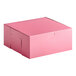 A pink Southern Champion cake box with a lid.