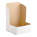 A white Southern Champion cake box with a brown lid.