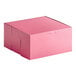 A pink Southern Champion cake box with a lid.