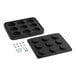 A black plastic mold with round holes for 9 round cavities.
