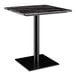 A black table with a black square base plate.