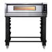 A stainless steel Moretti Forni pizza oven on wheels.