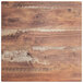 A Lancaster Table & Seating bar height table with a wooden table top with a textured Yukon Oak finish.