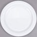 A white Thunder Group Nustone melamine plate with a narrow white rim.