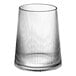 A close-up of a clear Acopa Lore stemless wine glass with a ribbed rim.