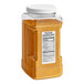 A large container of Badia Curry Powder with a white lid.