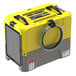 A yellow and grey AlorAir Storm Extreme LGR commercial dehumidifier with a hose attached.