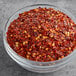 A bowl of Badia Crushed Red Pepper.