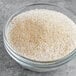 A bowl of Badia garlic salt.