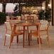A Lancaster Table and Chairs on an outdoor patio.